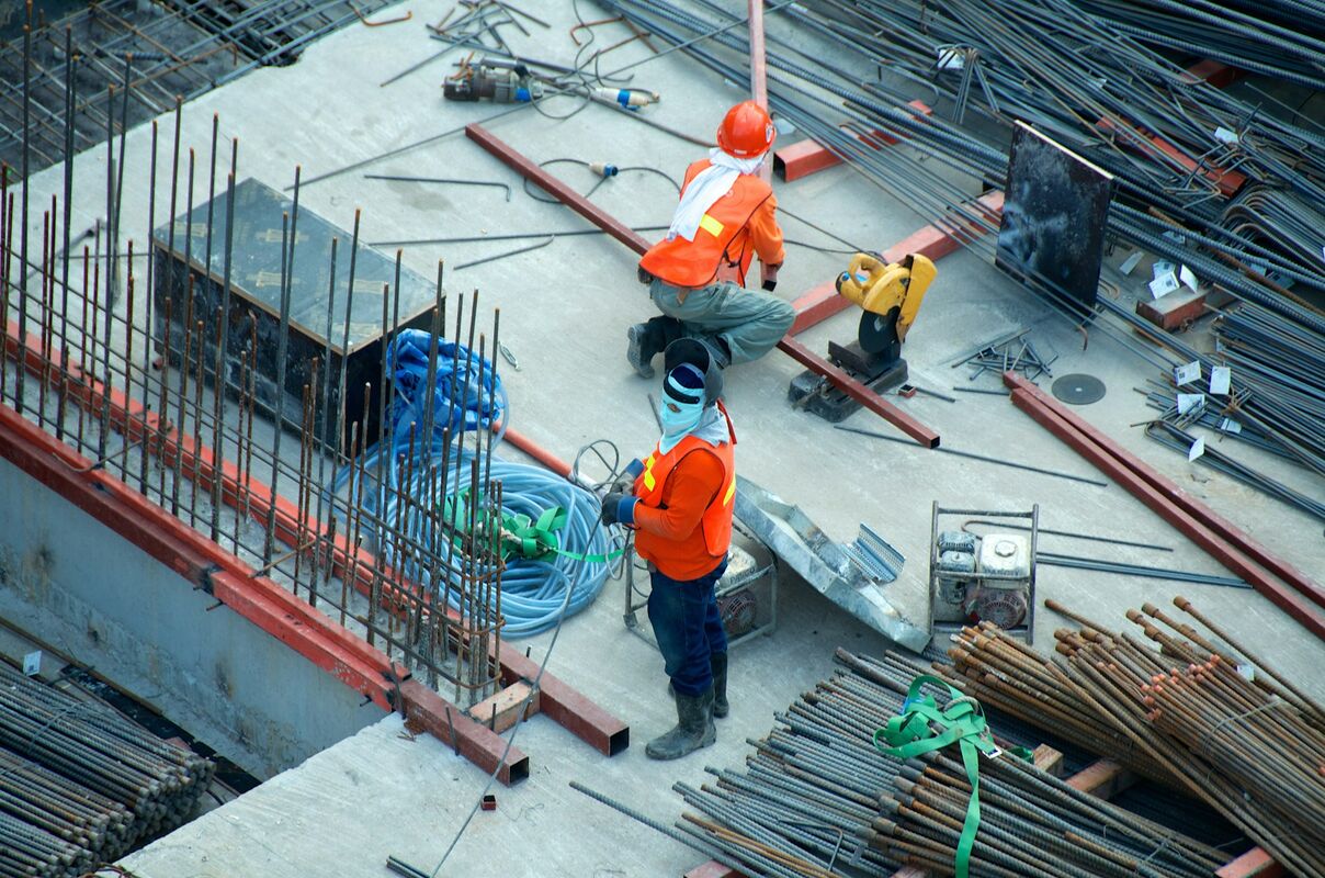 Professional construction workers renovating a home